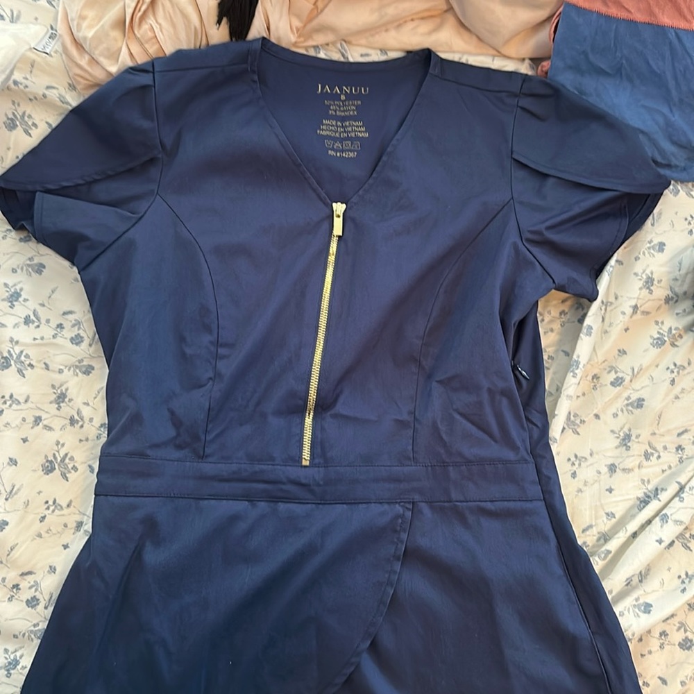 Jaanuu peplum scrub top
